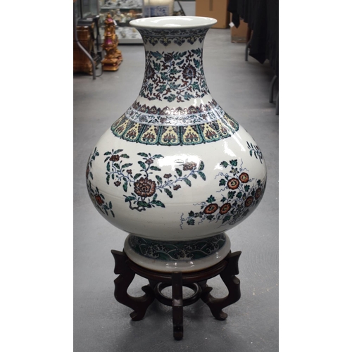 1289 - AN EARLY 20TH CENTURY CHINESE DOUCAI PORCELAIN HU VASE Late Qing/Republic, bearing Yongzheng marks t... 
