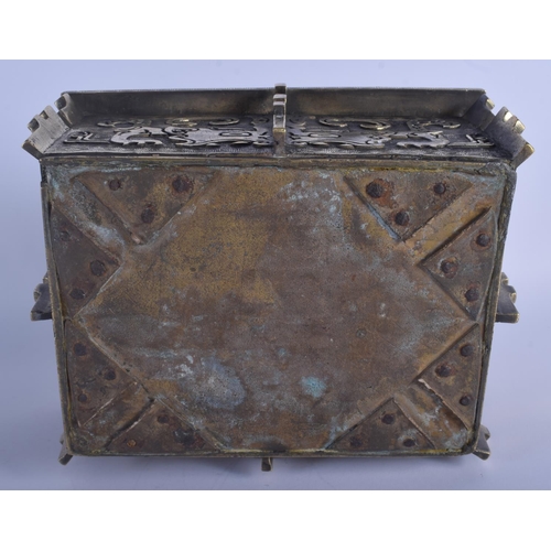 1301 - A LARGE 19TH CENTURY CHINESE TWIN HANDLED BRONZE CENSER Qing, of archaic form, decorated with mask h... 