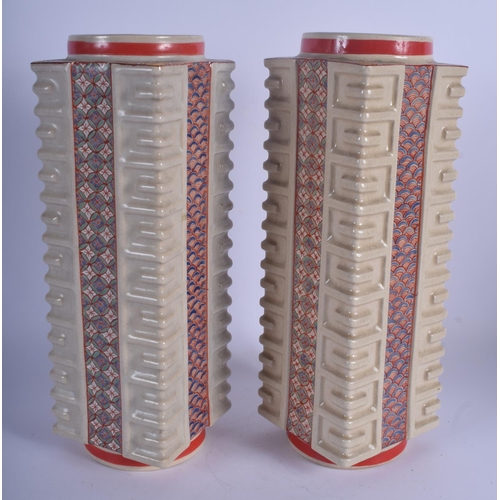 1312 - A PAIR OF EARLY 20TH CENTURY JAPANESE MEIJI PEIROD SATSUMA KONG VASES enamelled with foliage. 30 cm ... 