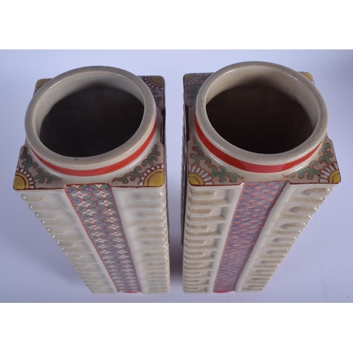 1312 - A PAIR OF EARLY 20TH CENTURY JAPANESE MEIJI PEIROD SATSUMA KONG VASES enamelled with foliage. 30 cm ... 