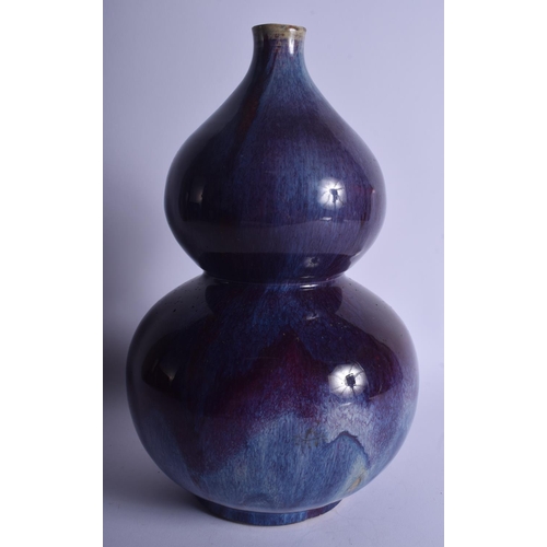 1313 - A CHINESE QING DYNASTY DOUBLE GOURD FLAMBE GLAZED VASE Qianlong/Jiaqing, of lovely mottled purple to... 