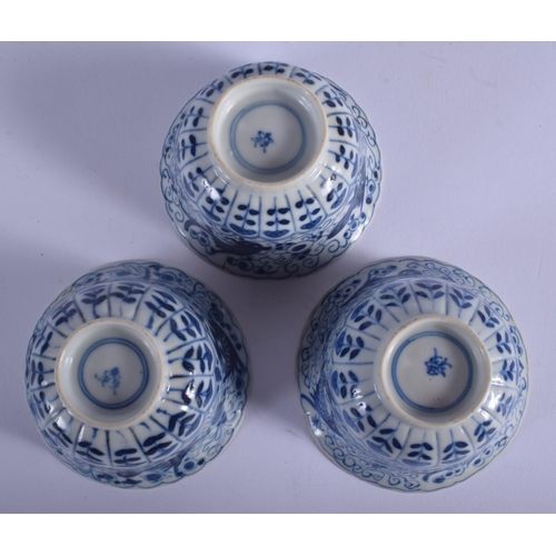 1317 - A SET OF THREE 19TH CENTURY CHINESE BLUE AND WHITE BARBED TEABOWLS AND SAUCERS Kangxi style, togethe... 