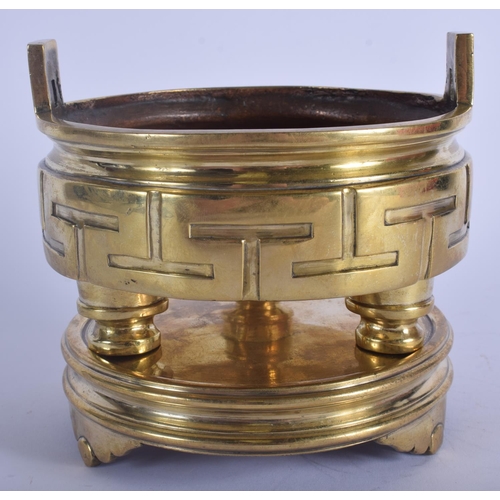 1322 - AN 18TH/19TH CENTURY CHINESE TWIN HANDLED BRONZE CENSER ON STAND Qing, decorated with archaic symbol... 