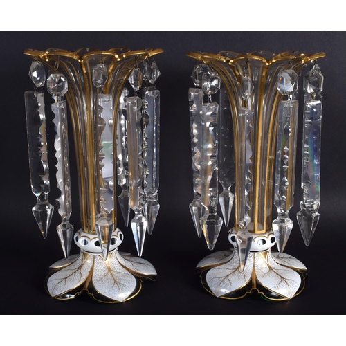 16 - A LARGE PAIR OF 19TH CENTURY BOHEMIAN ENAMELLED GLASS TABLE LUSTRES decorated with leaves. 29 cm x 1... 