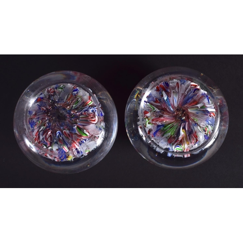 19 - A NEAR PAIR OF ANTIQUE FRENCH PAPERWEIGHTS probably Clichy or Baccarat. 7.25 cm wide.