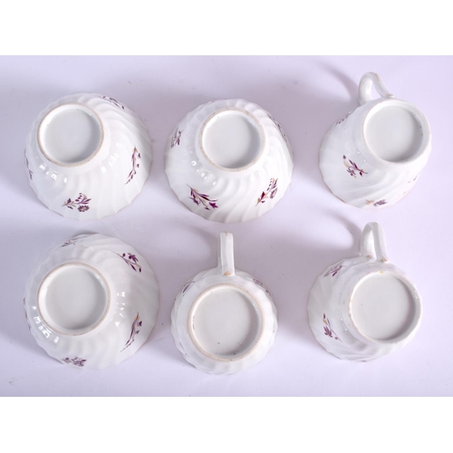 209 - Three Flight coffee cups, saucers and teabowls and a match slop bowl with puce flowers. 19.5 cm wide... 