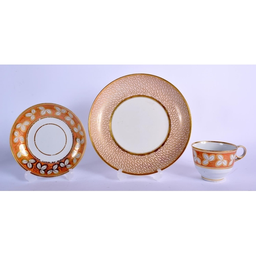 211 - Worcester Flight Barr and Barr  teacup and saucer gilded with leaves on a burnt orange ground and a ... 