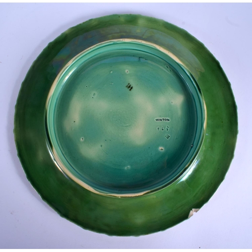 213 - A 19TH CENTURY MINTON MAJOLICA CIRCULAR DISH decorated with figures and foliage. 24 cm diameter.