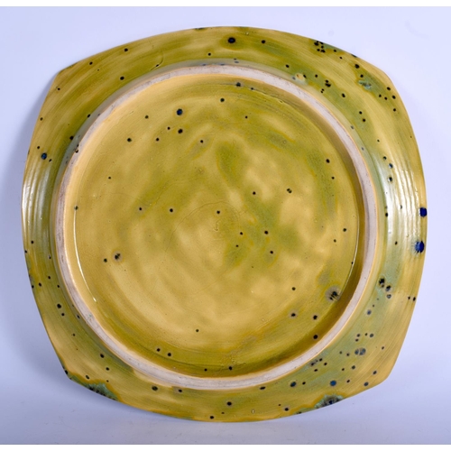 216 - A LARGE CONTEMPORARY STUDIO POTTERY SQUARE DISH enamelled in the Troika style. 32 cm square.