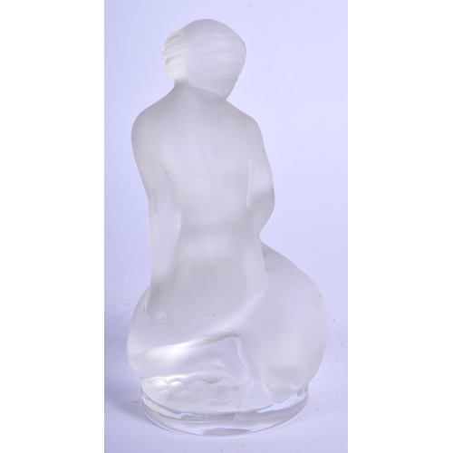 22 - A LALIQUE GLASS FIGURE OF A NUDE FEMALE beside a swan. 12 cm high.