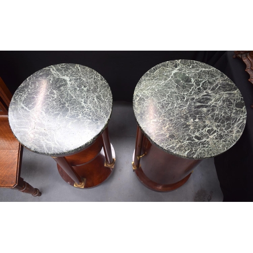 228 - A GOOD PAIR OF EARLY 19TH CENTURY FRENCH BEDSIDE TABLES with ormolu mounts and marble tops. Largest ... 