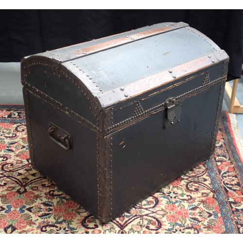 234 - AN ANTIQUE TRAVELLING BOX with domed leather top. 51 cm x 60 cm.