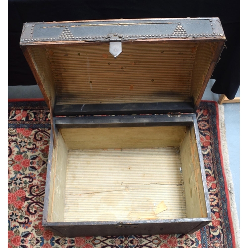 234 - AN ANTIQUE TRAVELLING BOX with domed leather top. 51 cm x 60 cm.