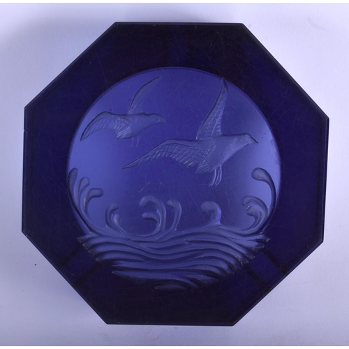 25 - AN ANTIQUE PURPLE GLASS ASHTRAY decorated with birds. 12.5 cm wide.