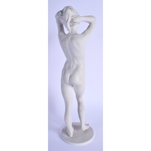 58 - A VINTAGE KAISER WEST GERMAN BISQUE PORCELAIN FIGURE OF A NUDE FEMALE. 33 cm high.