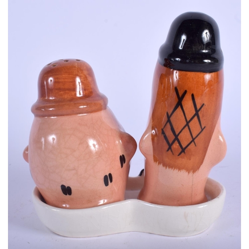 68 - A RARE BESWICK LAUREL AND HARDY CRUET SET. 10 cm x 12 cm.