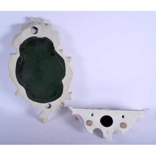 69 - A CONTINENTAL PORCELAIN WALL BRACKET together with a mirror. 46 cm & 34 cm long. (2)