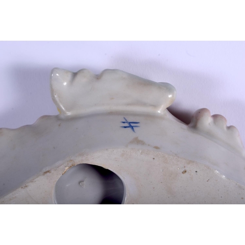 69 - A CONTINENTAL PORCELAIN WALL BRACKET together with a mirror. 46 cm & 34 cm long. (2)