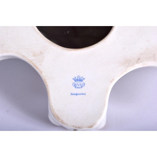 69 - A CONTINENTAL PORCELAIN WALL BRACKET together with a mirror. 46 cm & 34 cm long. (2)
