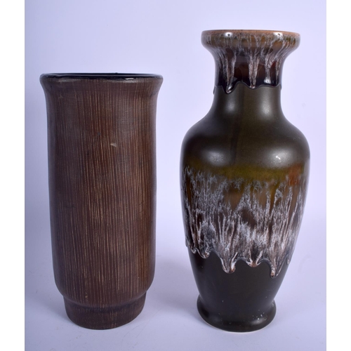 77 - A 1960S GERMAN RETRO POTTERY VASE together with another retro vase. Largest 26 cm high. (2)
