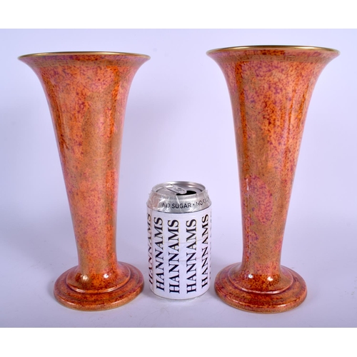 84 - A STYLISH PAIR OF WEDGWOOD LUSTRE ORANGE PORCELAIN VASES with internal foliate border. 25 cm high.