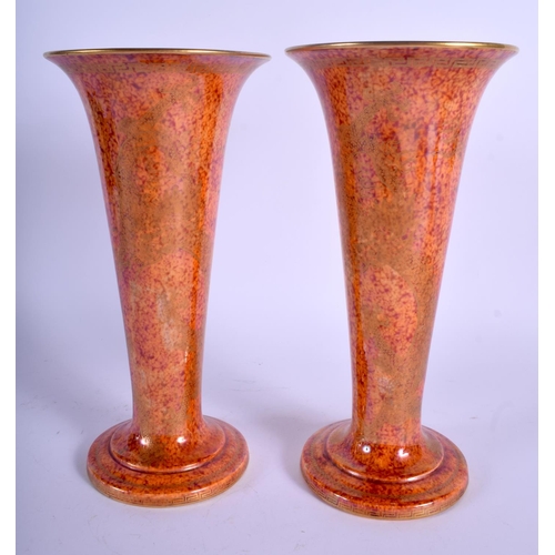 84 - A STYLISH PAIR OF WEDGWOOD LUSTRE ORANGE PORCELAIN VASES with internal foliate border. 25 cm high.