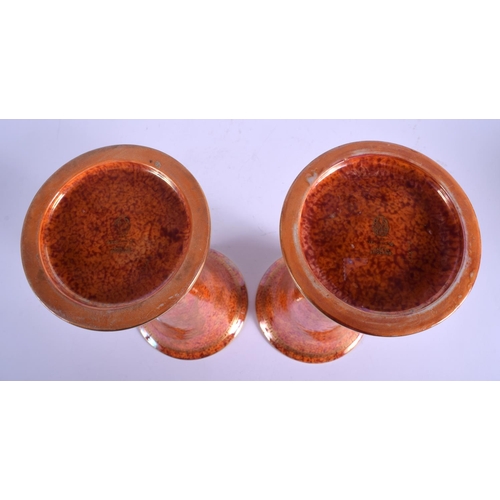 84 - A STYLISH PAIR OF WEDGWOOD LUSTRE ORANGE PORCELAIN VASES with internal foliate border. 25 cm high.