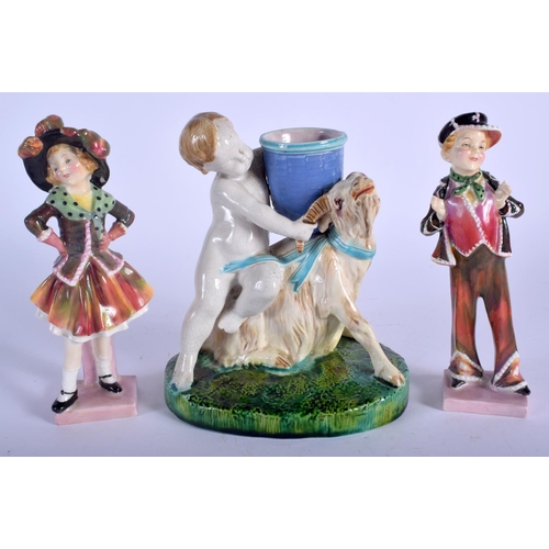 88 - A 19TH CENTURY MINTON POTTERY GOAT SPILL VASE together with a pair of doulton figures. (3)