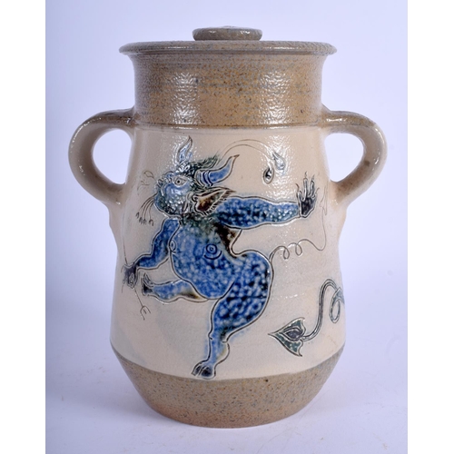 91 - MICHAEL AND JOANNE MOSSE FOR LLANBRYNMAIR POTTERY, A SALT-GLAZED STONEWARE  JAR AND COVER  20 cm hig... 