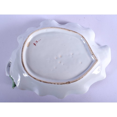 97 - AN 18TH/19TH CENTURY CONTINENTAL PORCELAIN LEAF SHAPED DISH possibly Lille, painted with figures. 25... 