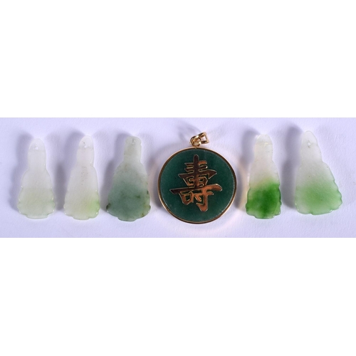 1001 - AN EARLY 20TH CENTURY CHINESE GOLD MOUNTED JADEITE PENDANT together with five jadeite carvings. (6)