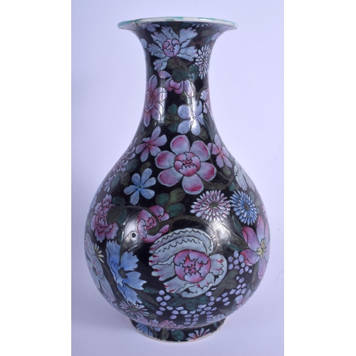 1002 - AN EARLY 20TH CENTURY CHINESE FAMILLE ROSE ENAMELLED YUHUCHUMPING VASE bearing Qianlong marks to bas... 