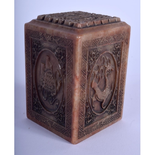 1014 - A CHINESE CARVED SOAPSTONE SEAL 20th Century, decorated with birds. 7.5 cm x 4.75 cm.