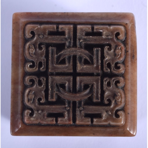 1014 - A CHINESE CARVED SOAPSTONE SEAL 20th Century, decorated with birds. 7.5 cm x 4.75 cm.