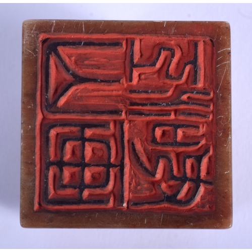 1014 - A CHINESE CARVED SOAPSTONE SEAL 20th Century, decorated with birds. 7.5 cm x 4.75 cm.