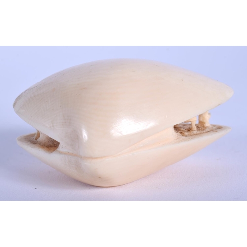 1017 - A 19TH CENTURY CHINESE CARVED IVORY CANTON CLAM SHELL Late Qing. 5 cm x 3.25 cm.