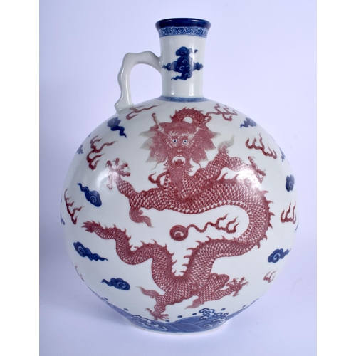 1020 - A LARGE CHINESE BLUE AND WHITE PORCELAIN MOON FLASK 20th Century, bearing Qianlong marks to base, pa... 