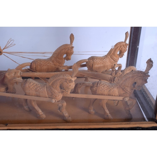 1023 - A 1950S SOUTH EAST ASIAN CARVED SANDALWOOD FIGURE OF A CART modelled with attendants. Figure 37 cm x... 