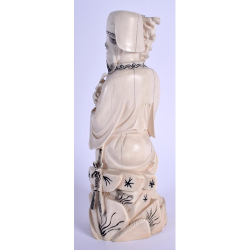 1029 - AN EARLY 20TH CENTURY CHINESE CARVED IVORY FIGURE OF AN IMMORTAL Late Qing. 22 cm high.