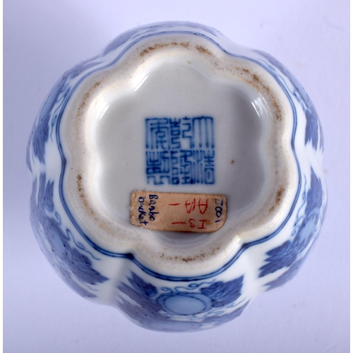 1039 - A LOVELY 19TH CENTURY CHINESE BLUE AND WHITE PORCELAIN VASE bearing Qianlong marks to base, of melon... 