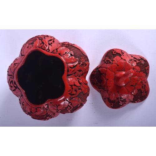 1041 - A 1930S CHINESE RED LACQUER MELON FORM BOX AND COVER decorated with foliage. 12 cm x 12 cm.