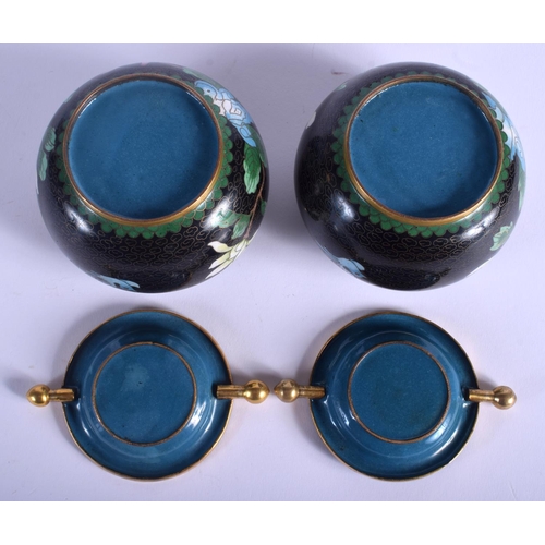 1047 - A PAIR OF 1950S CHINESE CLOISONNÉ ENAMEL ASHTRAYS decorated with birds. 8.5 cm wide.