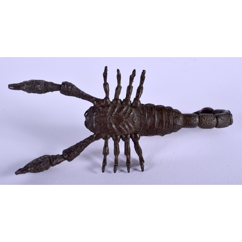 1050 - A JAPANESE BRONZE OKIMONO modelled as a scorpion. 10 cm x 3.5 cm.