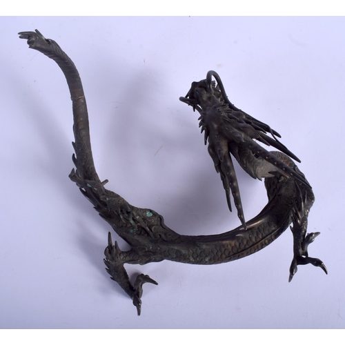 1055 - A 19TH CENTURY JAPANESE MEIJI PERIOD BRONZE DRAGON modelled holding a clear crystal ball. 27 cm x 16... 