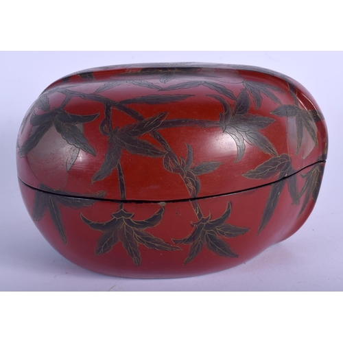 1066 - A 1950S CHINESE RED LACQUER PEACH FORM BOX AND COVER decorated with leaves. 20 cm x 17 cm.