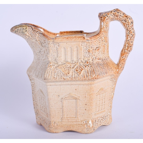 107 - A VERY RARE 19TH CENTURY ENGLISH STONEWARE CREAM JUG in the form of a house. 11 cm x 8 cm.