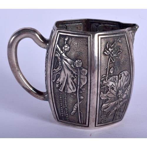 1079 - A 19TH CENTURY CHINESE EXPORT SILVER EXPORT JUG by Sing Fat, decorated with flowers and birds. 214 g... 