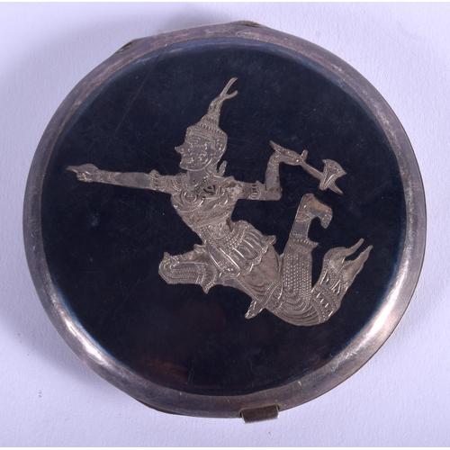 1087 - AN EARLY 20TH CENTURY THAI SILVER BUDDHISTIC COMPACT. 110 grams. 9 cm diameter.
