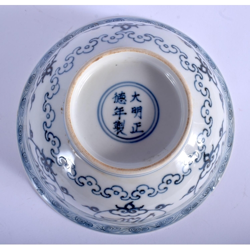 1098 - A CHINESE BLUE AND WHITE PORCELAIN BOWL 20th Century, bearing Zhengdhe marks to base, painted with c... 