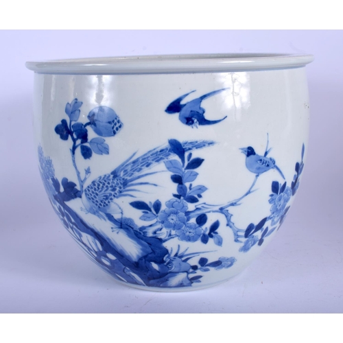 1111 - A CHINESE QING DYNASTY BLUE AND WHITE PORCELAIN JARDINIERE probably Late Kangxi period, painted with... 